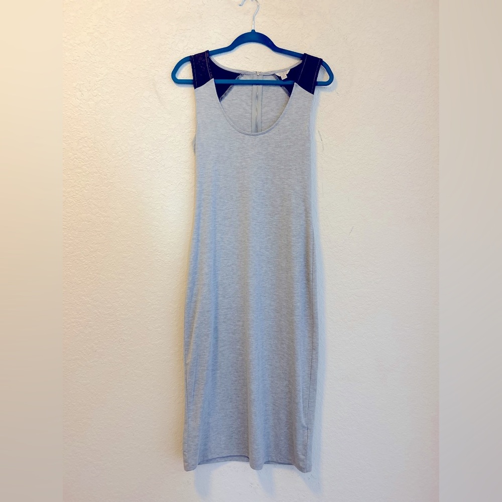 Gray dress with black pleather shoulders , size medium.